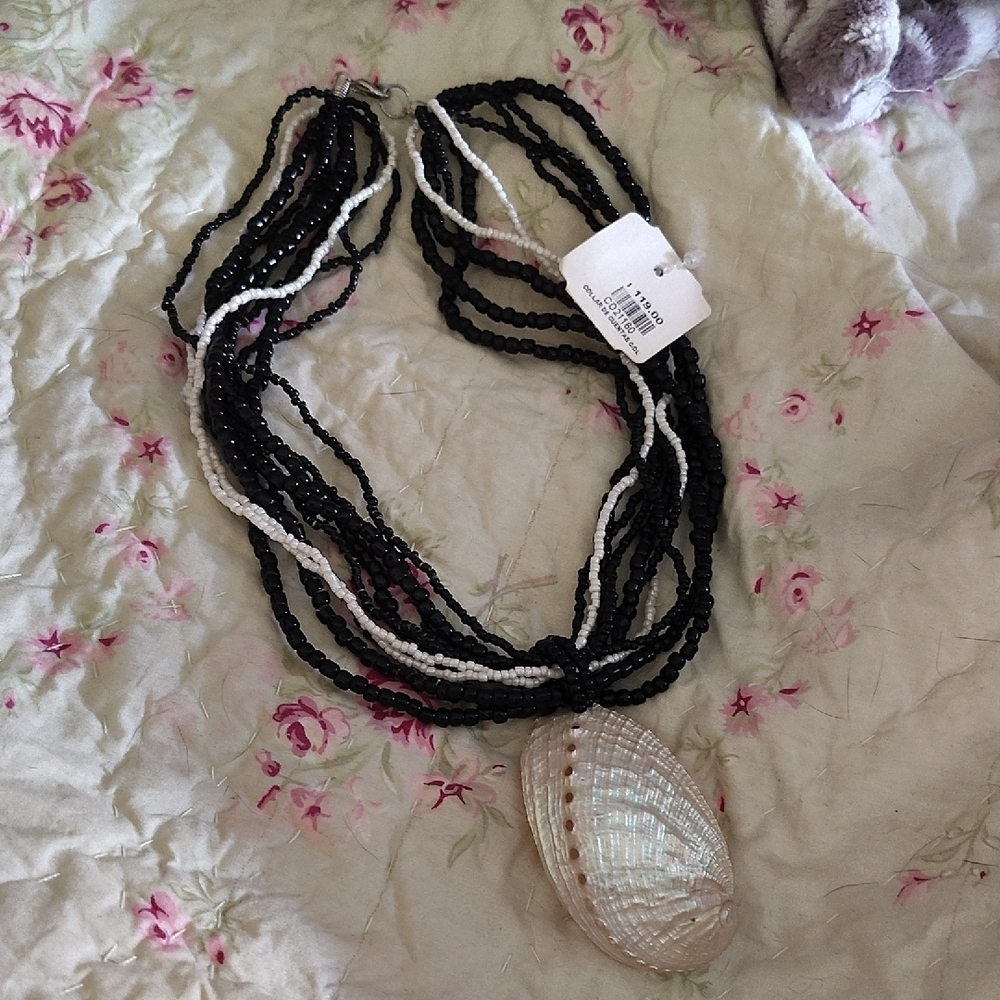 Elegant Black and White Beaded Necklace with Shell Pendant